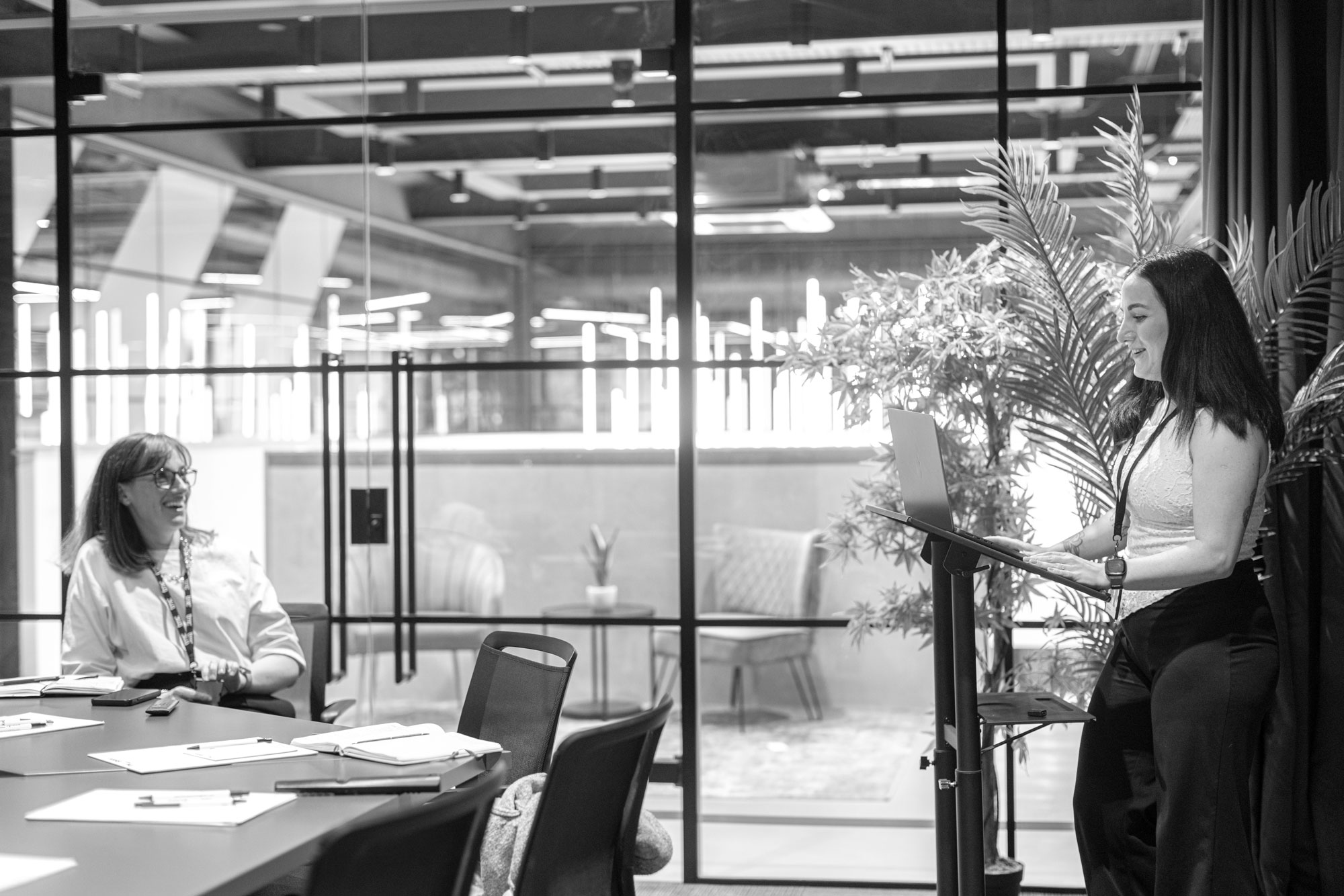 woman is presenting in boardroom